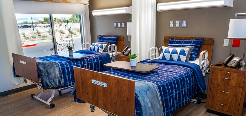 Double Occupancy bedroom with new, matching bed sheets and blankets and room accents to make it feel like home.